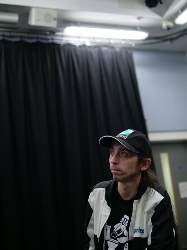 http://An%20Uncurbed%20Artist%20is%20sat%20in%20a%20workshop%20space.%20They%20are%20listening.