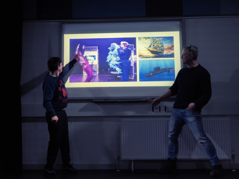 http://Michael%20Gleave%20and%20Tom%20Hogan%20presenting%20to%20an%20audience